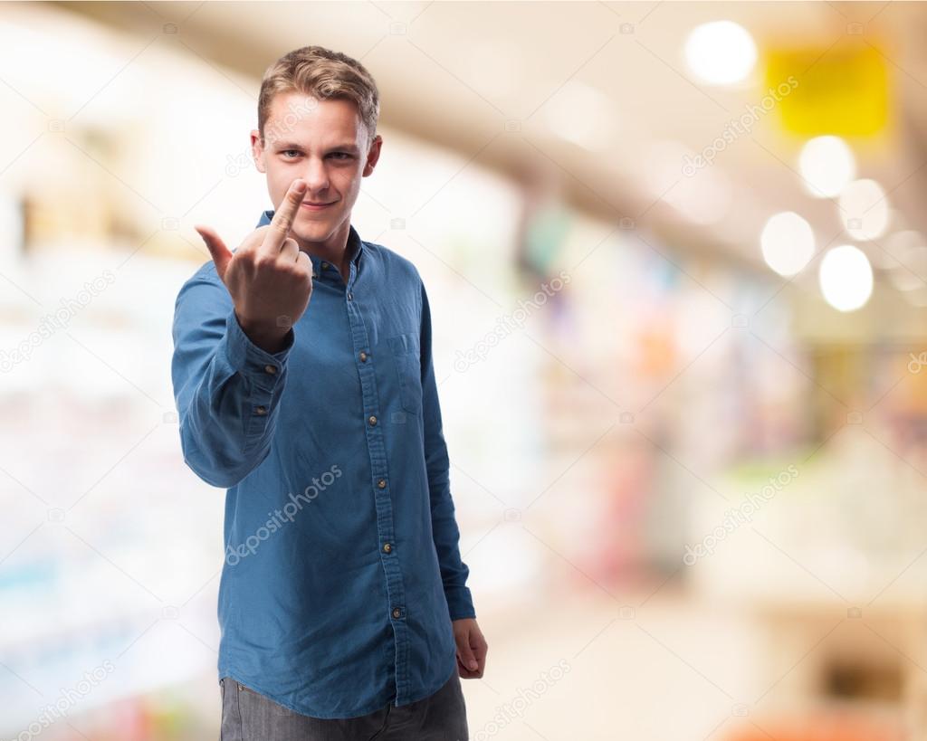 Happy man shows insult sign