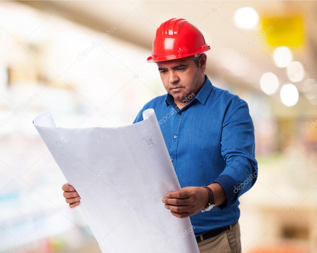 Architect thinking about his project