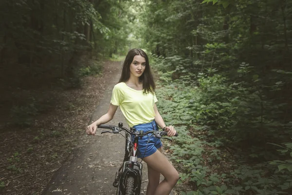 Girl Walks Forest Her Bike Shot Taken Summer Tall Trees — Stock Photo, Image