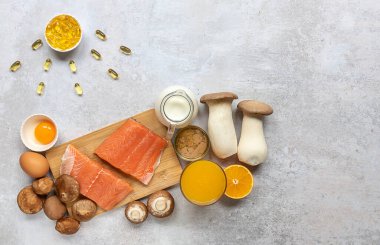 D vitamini, konserve ton balığı, mantar, somon balığı, yumurta, süt ve portakal suyu içeren düz bir bileşim. D vitamini için harika bir kaynak..