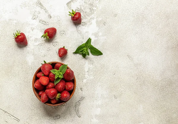 Fresh ripe strawberry with mint. Summer sugar-free dessert or snack.