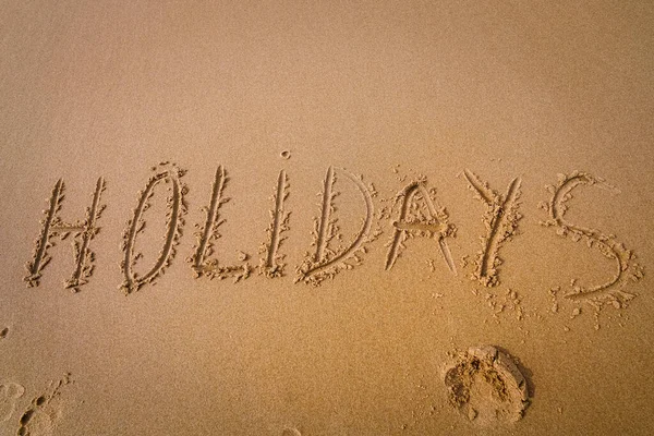 Λέξη Διακοπές Γραμμένο Στην Παραλία Άμμο — Φωτογραφία Αρχείου