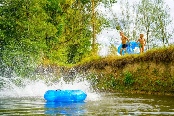 Excited Happy Children Jumping River Immagini Stock Royalty Free