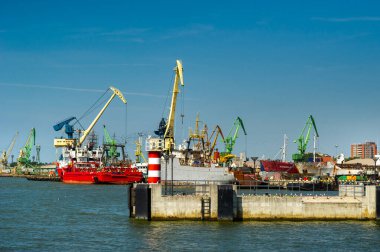 August 16, 2017: Klaipeda, Lithuania.Boats and cranes in the port of Klaipeda.