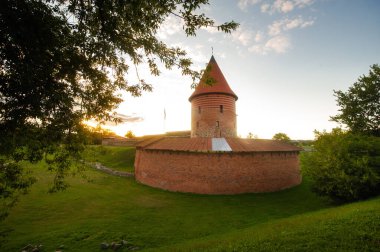 Kaunas castle in the Gothic style in summer at sunset, Lithuania.