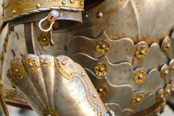 Parts of ancient knight's armor.A medieval concept.Metallic texture.
