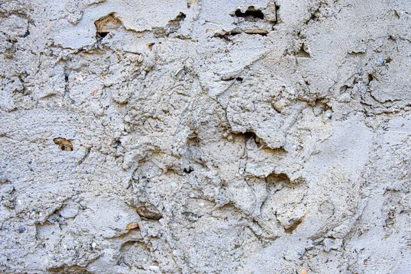 Sert beton arka plan. Kurumuş beton ve çimentodan yapılmış kaba bir doku. Somut doku.