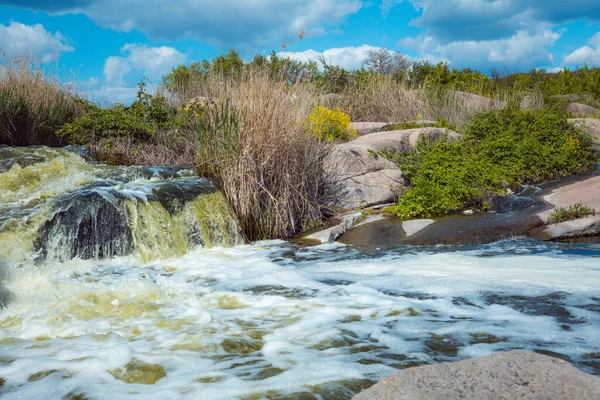 stock image The murmuring waters of the Tokovsky waterfall in Ukraine. This is the only steppe waterfall in the world.