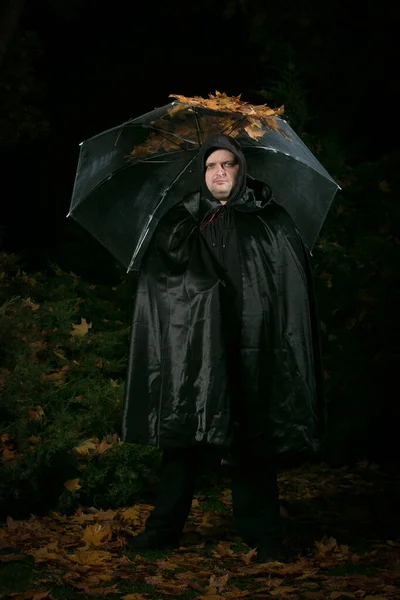 Portrait Man Dressed Dracula Guy Holds Open Umbrella His Hands — Φωτογραφία Αρχείου