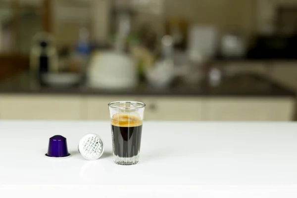 Single-serve espresso shot coffee capsules — Stock Photo, Image