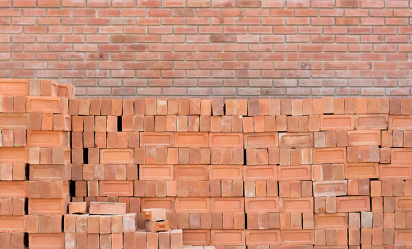 Wall building with  bricks in construction site