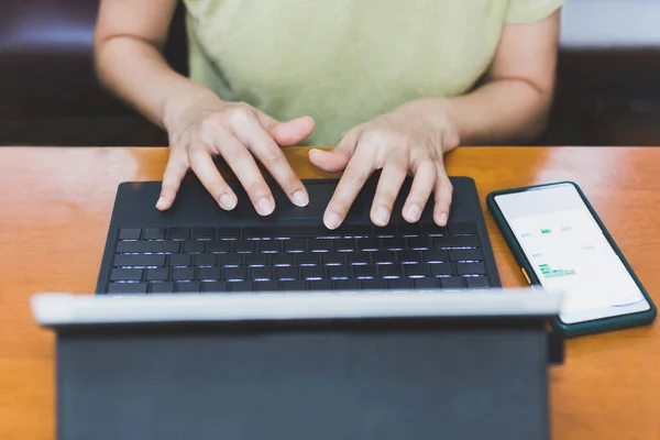 Top view of woman hand typing on laptop computer . — Stock Photo, Image