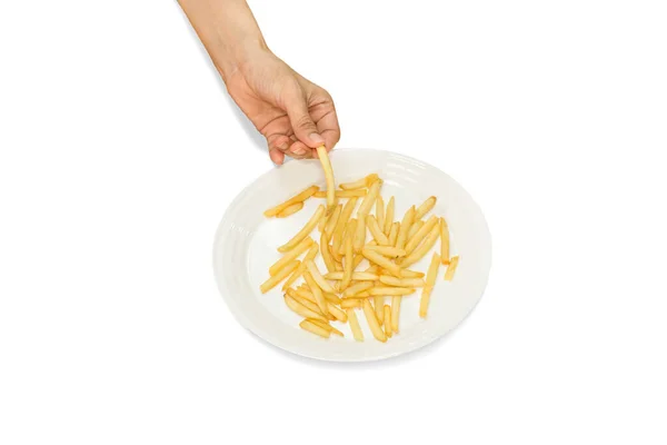 Woman taking out french fries from the plate isolated in clipping path. — Stock Photo, Image