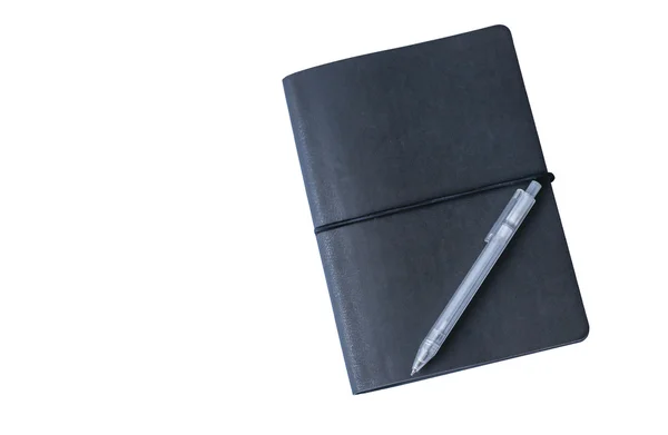 Zwarte notebook en pen — Stockfoto
