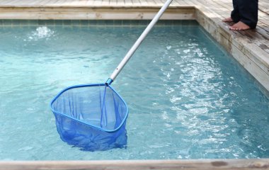 Cleaning and maintenance swimming pool with net skimmer clipart