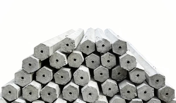 The pile of hexagon concrete foundation piles isolated — Stock Photo, Image