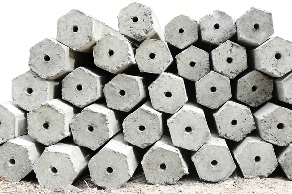 The pile of hexagon concrete foundation piles isolated — Stock Photo, Image