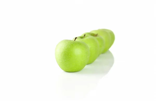 Green apple in a line isolated — Stock Photo, Image