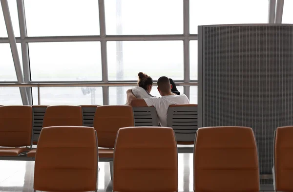 Couple waiting at the international airport termina — Stock Photo, Image
