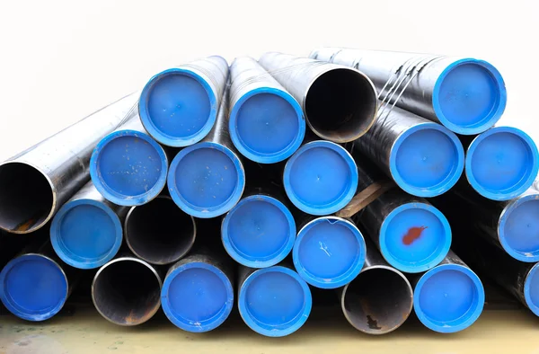 Stacks of black water pipes — Stock Photo, Image