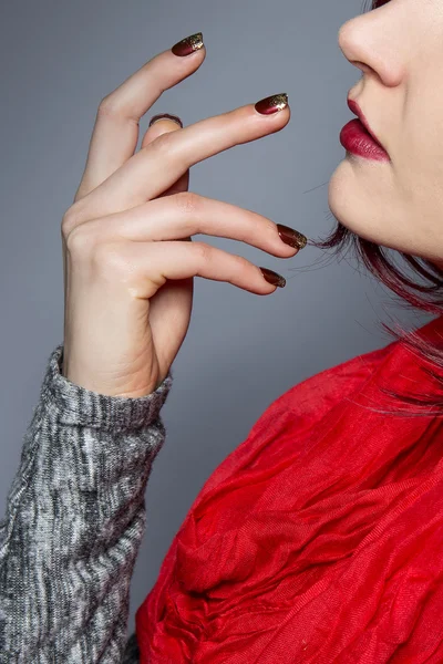 Woman showing nail polish art — Zdjęcie stockowe