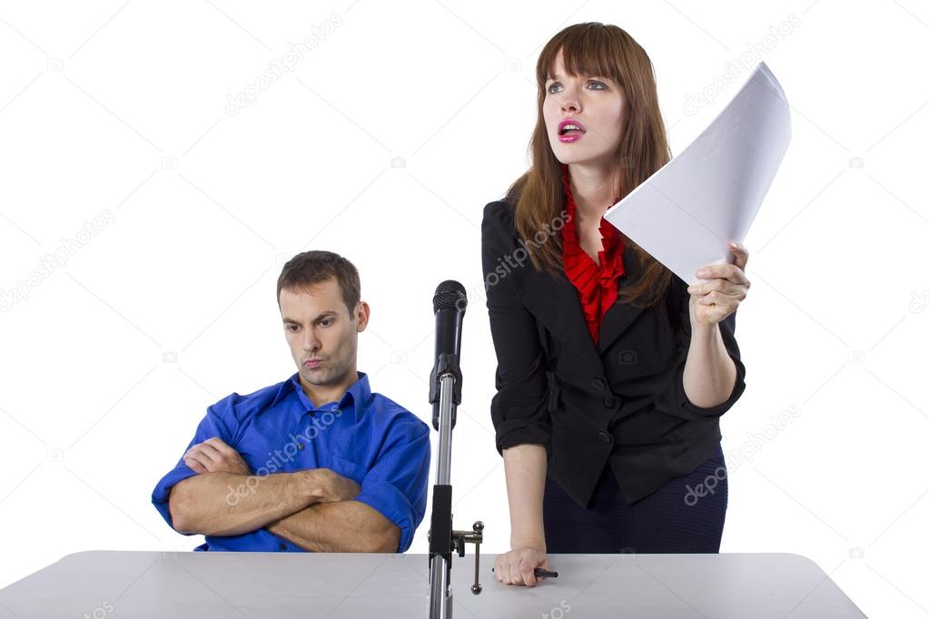 Female lawyer representing male client in a court hearing