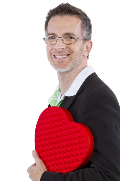 Человек позирует на День Святого Валентина или здоровья сердца — стоковое фото