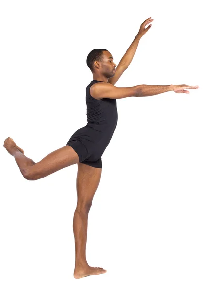 Tänzer balanciert, um Ballettformen zu zeigen — Stockfoto