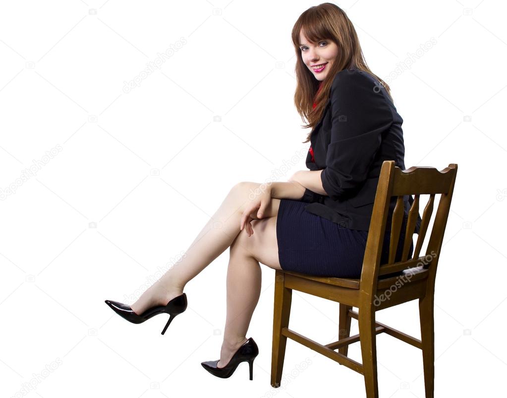 Female Executive sitting on a chair