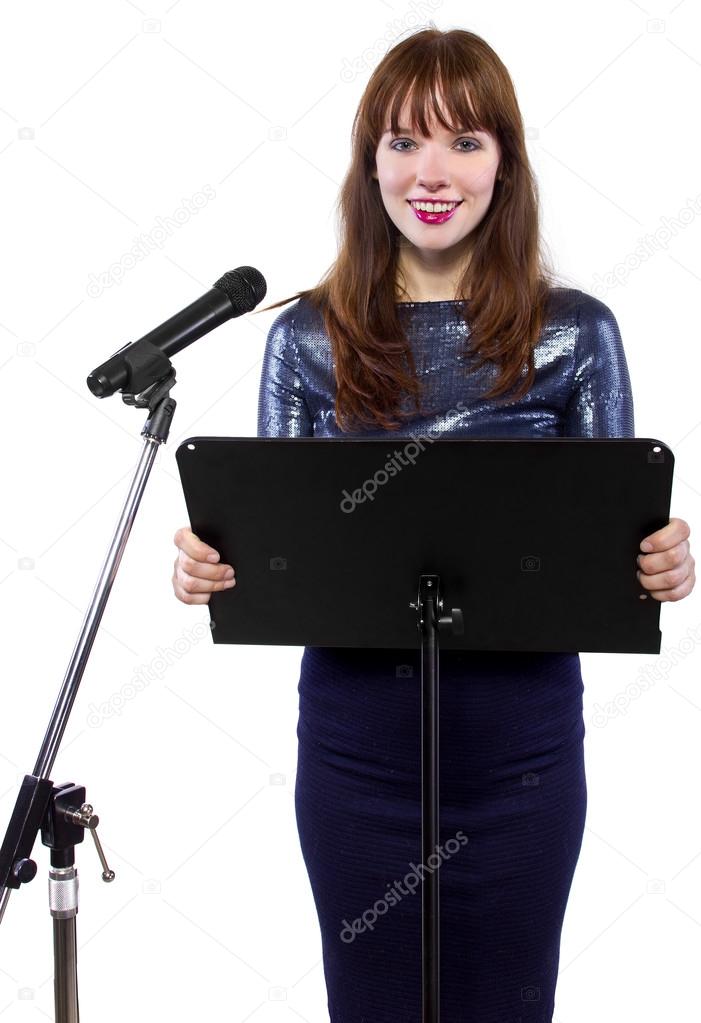 Girl speaking into a microphone