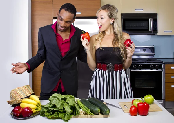 Couple preparing in the kitchen — Stock Photo, Image