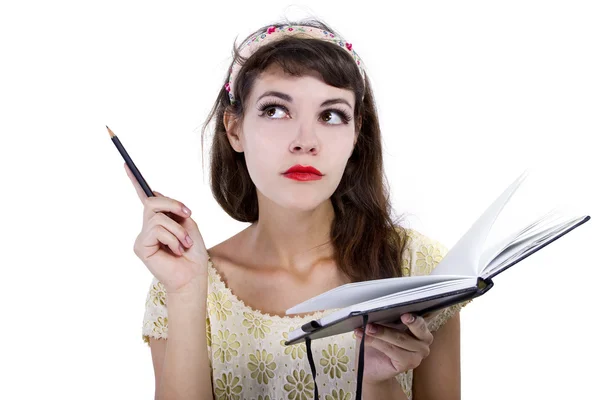 Ragazza con libro di schizzi e matita — Foto Stock