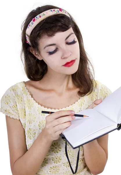 Meisje met schetsboek en potlood — Stockfoto