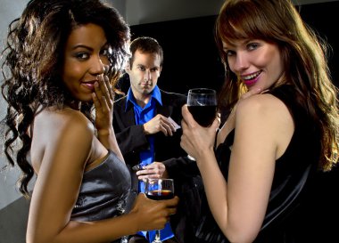 Women seducing man at bar clipart