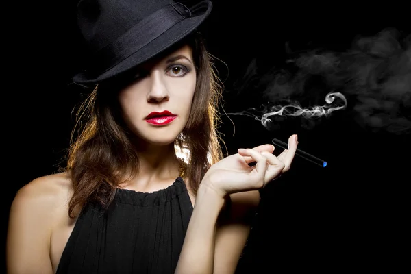 Female vaping an electronic cigarette — Stock Photo, Image