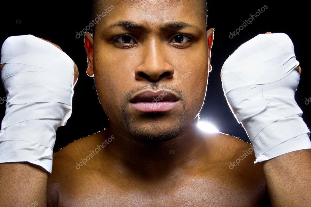 Fighter holding fists up