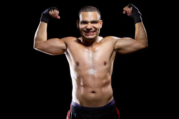 MMA fighter flexing muscles — Stock Photo, Image