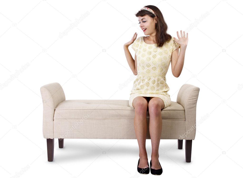 Retro woman sitting on sofa