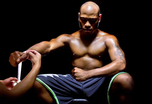 Boxer with trainer applying athletic tape — Stock Photo, Image