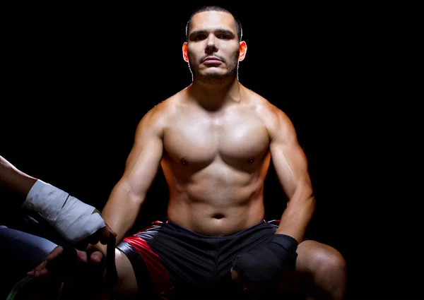 Boxer with trainer applying athletic tape — Stock Photo, Image