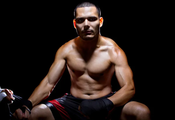 Boxer with trainer applying athletic tape — Stock Photo, Image