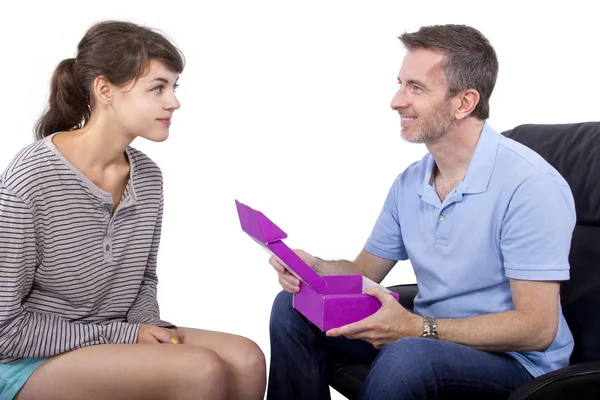 Daughter giving gift to father — Stock Photo, Image