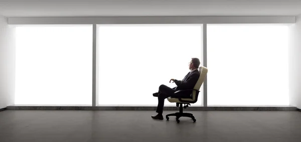 Businessman in empty office — Stock Photo, Image