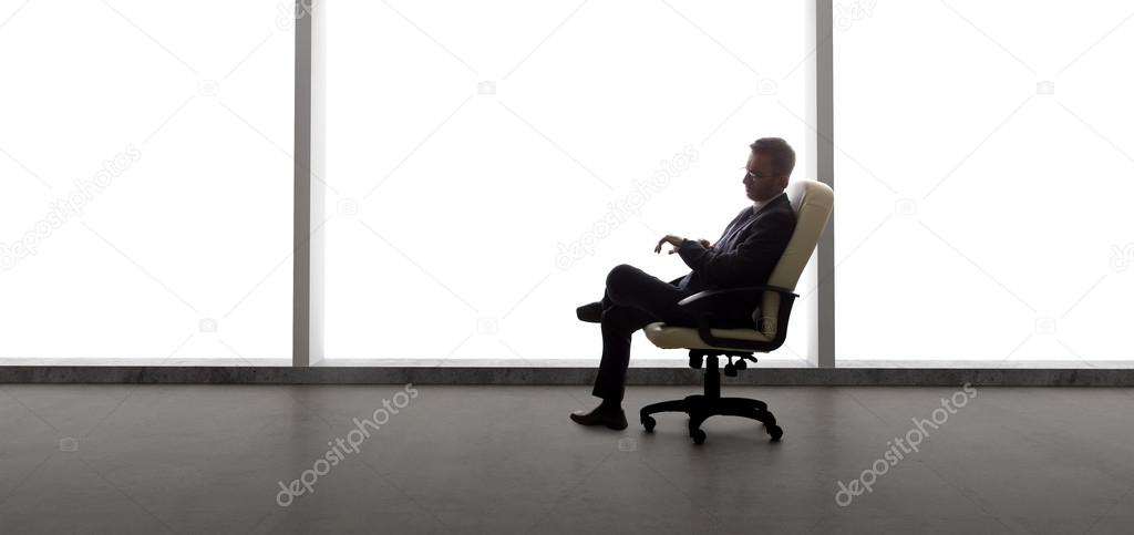 Businessman in empty office