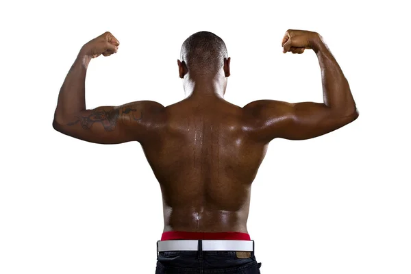 Man flexing back muscles — Stock Photo, Image