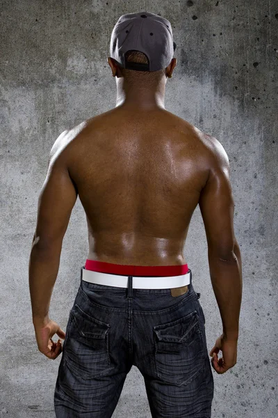 Man flexing back muscles — Stock Photo, Image