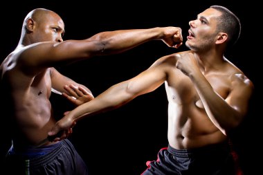 fight instructor demonstrating self defense clipart