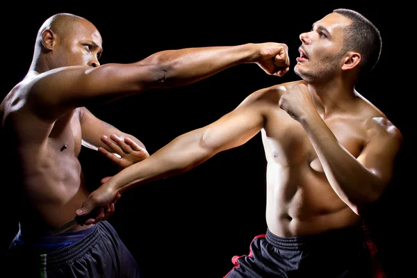 Fight instructor demonstrating self defense — Stock Photo, Image