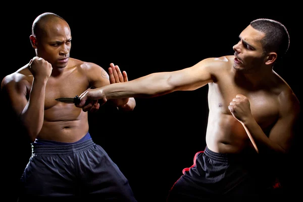 Fight instructor demonstrating self defense — Stock Photo, Image