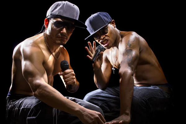 Shirtless men with microphones — Stock Photo, Image